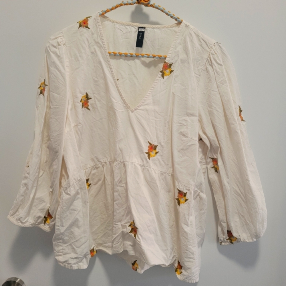 Top with embroidered flowers